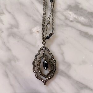 Black pendant necklace.